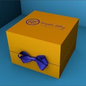 A yellow box with purple bow on top of blue table.